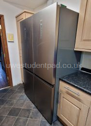 Two large fridge freezers with zero frost technology